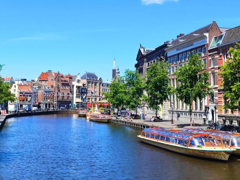 Historic buildings along the canal seen during the Amsterdam self-guided city game