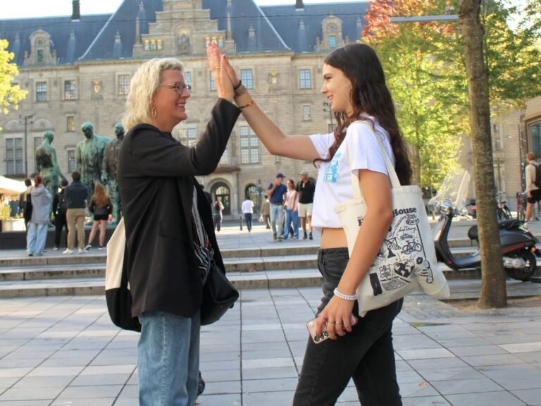 players-high-fiving-success-city-game