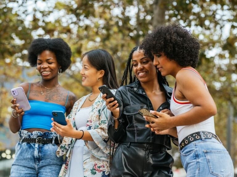 team-reviewing-screen-outdoors