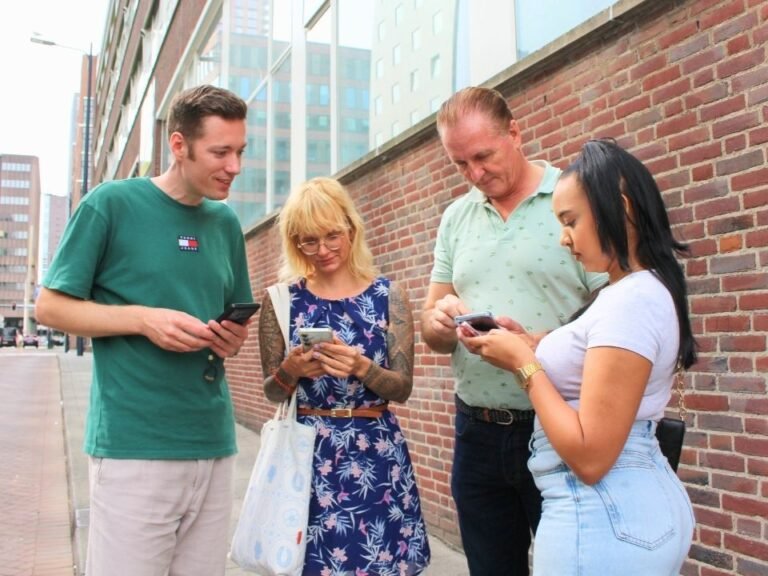 team-using-phone-progress-game